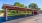 Carport with trees in background